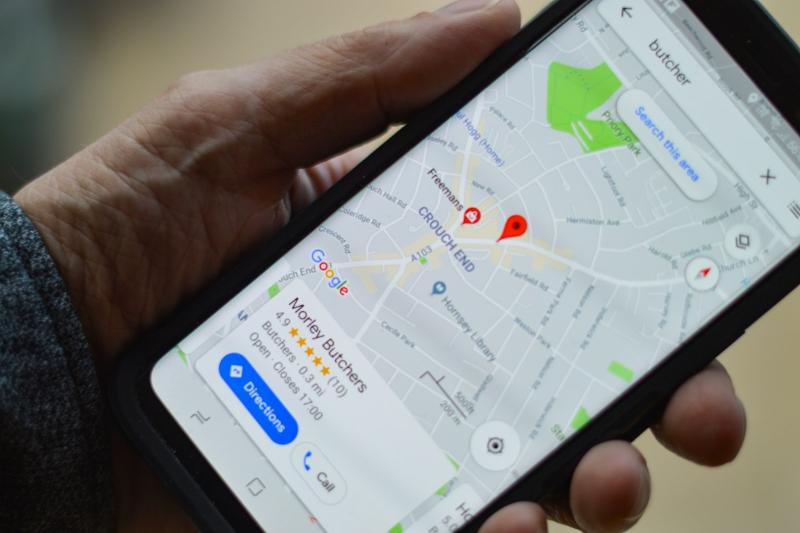 Phone showing local businesses on Google Maps